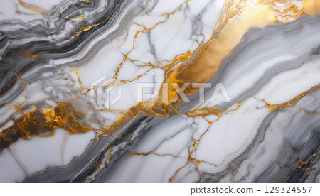 Polished marble surface with intricate veining patterns and golden accents 129324557