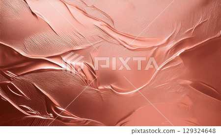 Elegant rose gold foil texture background with soft reflections and shimmering metallic surface, creating luxurious feel 129324648