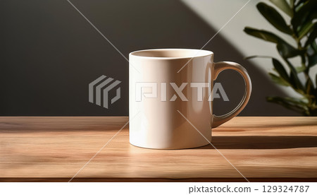sleek minimalist mug on wooden table with soft natural lighting and gentle shadows creates calming atmosphere 129324787