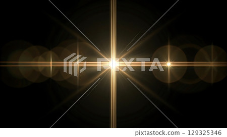 Symmetrical golden light rays with circular flares spreading from center on black digital backdrop Symmetrical golden light rays with circular flares spreading from center on black digital backdrop 129325346