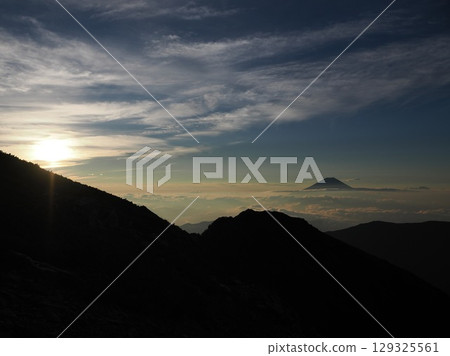 Mount Fuji at sunrise as seen from the summit of Senmai-dake Mount Fuji at sunrise as seen from the summit of Senmai-dake 129325561