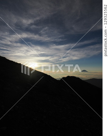 Mount Fuji at sunrise as seen from the summit of Senmai-dake 129325562