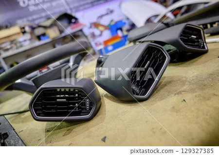 Car Repair Workshop Mechanics Working with Parts 129327385