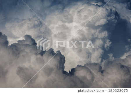 Dramatic cumulus Cloud Formations in the Sky 129328075