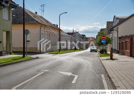 Colorful houses on a quiet street in Nagykanizsa, Hungary. Colorful houses on a quiet street in Nagykanizsa, Hungary. 129328090