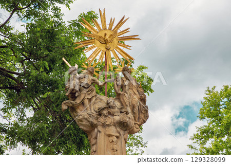 Baroque Holy Trinity column statues closeup in Nagykanizsa, Humgary. 129328099