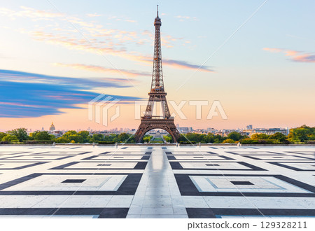 Front view of Eiffel Tower, famous place of visit of Paris, sunrise photo Front view of Eiffel Tower, famous place of visit of Paris, sunrise photo 129328211