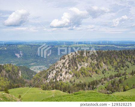 Chasseral, Switzerland - May 26th 2024: Wind engines embedded in the landscape of Mont Crosin 129328225