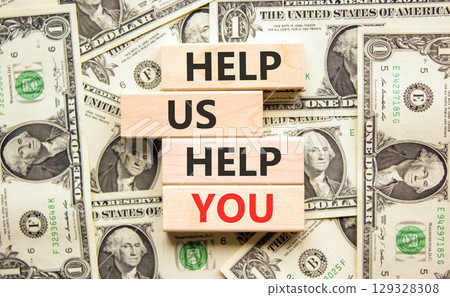 Help you symbol. Concept words phrase Help us help you on beautiful wooden blocks. Dollar bills. Beautiful dollar bills background. Business Help you concept. Copy space. Help you symbol. Concept words phrase Help us help you on beautiful wooden blocks. Dollar bills. Beautiful dollar bills background. Business Help you concept. Copy space. 129328308