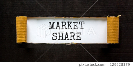 Market share symbol. Concept words Market share on beautiful white paper. Beautiful black paper cardboard background. Business and Market share concept. Copy space. 129328379