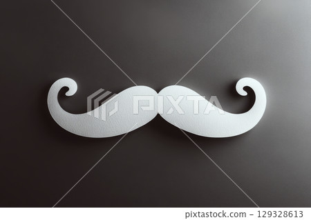 White mustache-shaped decoration on a dark textured background. Concept of style, masculinity, humor. For design elements. 129328613