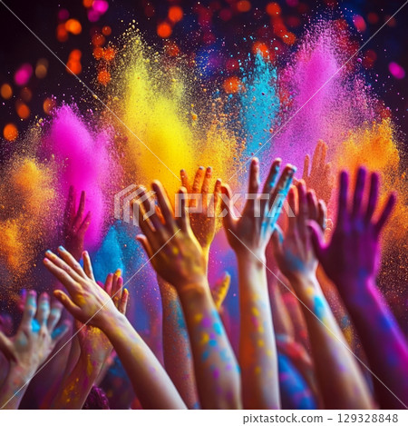 Many hands reach up, covered in vibrant powders of pink, yellow, and blue in the air. Concept of celebration and joy. For festival photo. 129328848
