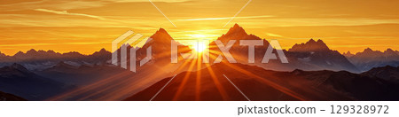 Majestic mountains with the sun setting, casting rays across the sky. Concept of nature's beauty and tranquility. For landscape backgrounds. 129328972