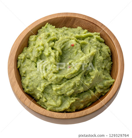 Fresh guacamole in rustic wooden bowl, creamy avocado dip isolated, mexican cuisine concept Fresh guacamole in rustic wooden bowl, creamy avocado dip isolated, mexican cuisine concept 129329764