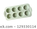 Empty clean silicone mold for baking cakes, muffins, making ice-cream, homemade desserts and pastry, heat-resistant kitchenware, modern trendy equipment, isolated image, clipping path, soft focus 129330114
