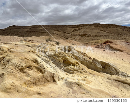 Kholot Tsivoniyim - mountains and dunes of multi-colored sand Kholot Tsivoniyim - mountains and dunes of multi-colored sand 129330163