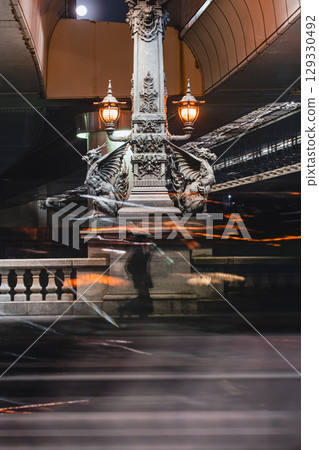 Nihonbashi Kirin statue and afterimages of pedestrians 129330492