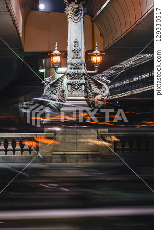 Kirin statue at Nihonbashi and car light trails 129330517