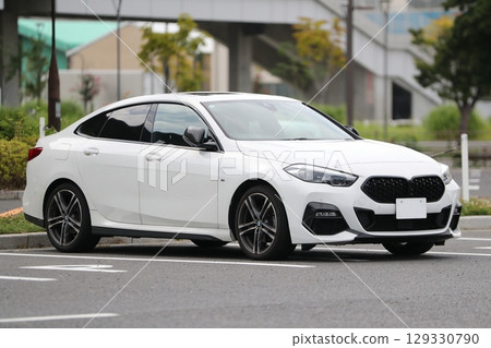 Image of a white German sedan 129330790