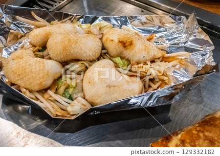 Teppanyaki | Stir-fried squid and vegetables Teppanyaki | Stir-fried squid and vegetables 129332182