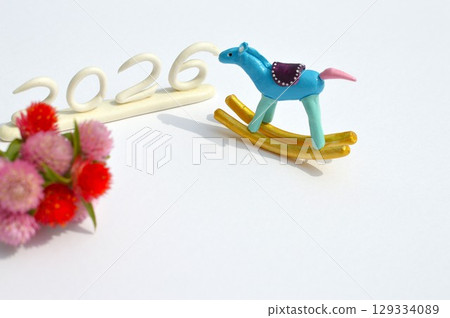 Paper clay rocking horse and globe amaranth New Year's materials 129334089