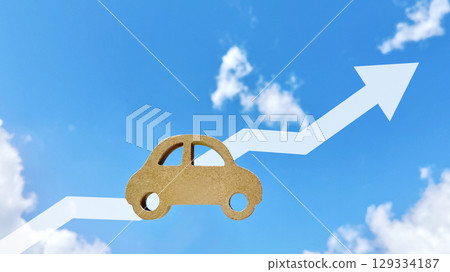 天然汽車配件和向上傾斜的鋸齒形箭頭_藍天背景 天然汽車配件和向上傾斜的鋸齒形箭頭_藍天背景 129334187