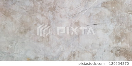 Abstract textured concrete wall with cracks and stains 129334270