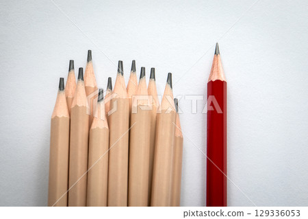 Be Unique. Red Pencil Showing Individuality, Standing Out from the Group of Identical Choices 129336053