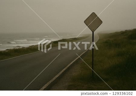 Road sign leading to the sea 129336102