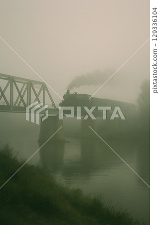 Bridge shrouded in fog 129336104