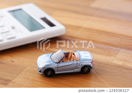 calculator and car calculator and car 129336327