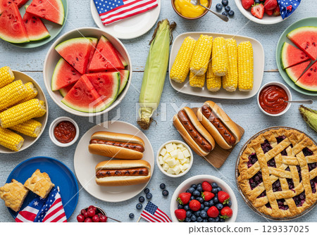 4th of July BBQ Feast Hot Dogs, Watermelon, Corn, and Pie 129337025