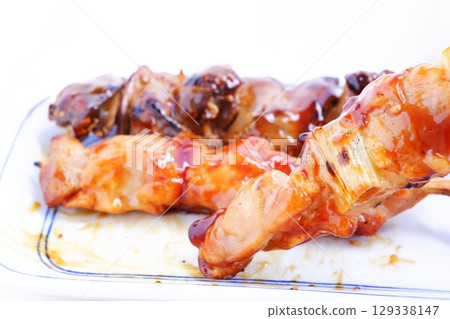 Yakitori - A delicious assortment of yakitori (negima, thigh, and liver) Yakitori - A delicious assortment of yakitori (negima, thigh, and liver) 129338147