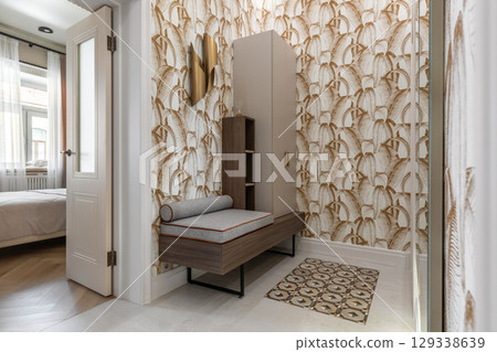 Cozy Hallway with Bench and Bedroom Entrance 129338639