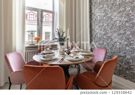Modern Dining Room with Velvet Chairs and Elegant Tableware Modern Dining Room with Velvet Chairs and Elegant Tableware 129338642