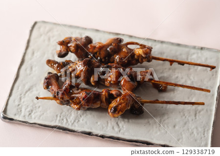Grilled eel liver skewers (stock photo) Grilled eel liver skewers (stock photo) 129338719