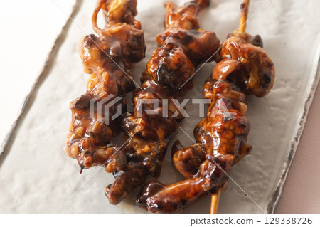 Grilled eel liver skewers (stock photo) Grilled eel liver skewers (stock photo) 129338726