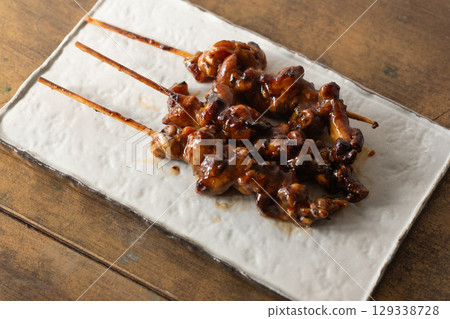 Grilled eel liver skewers (stock photo) 129338728