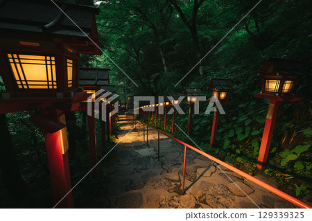 Traditional lanterns at Kifune Shrine in summer evening in Kyoto, Japan Traditional lanterns at Kifune Shrine in summer evening in Kyoto, Japan 129339325