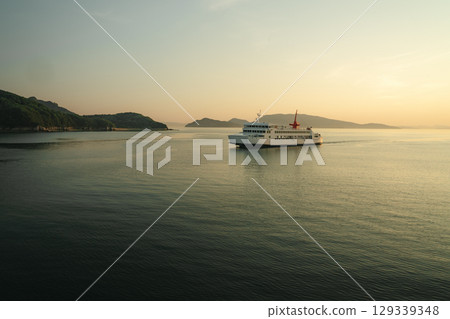 Ferry at Sunset over the Setouchi Sea, Japan 129339348