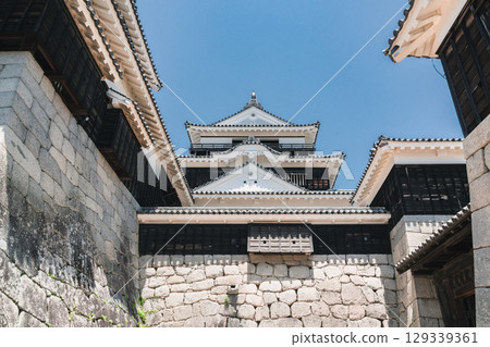 Traditional Japanese Castle Structures Overlooking Matsuyama City 129339361