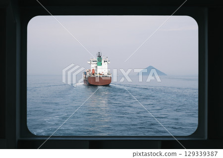 Window view on a ferry in the Seto Inland Sea, Japan Window view on a ferry in the Seto Inland Sea, Japan 129339387
