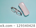 Pink Glasses and Case on Blue, Vision and Eye Care Essentials 129340428