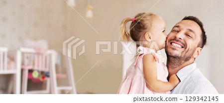 Happy Moment Concept. Portrait of blonde toddler girl kissing and hugging her smiling father Happy Moment Concept. Portrait of blonde toddler girl kissing and hugging her smiling father 129342145