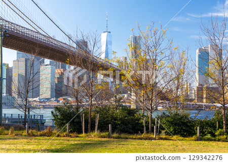 A panoramic view of the Brooklyn Bridge stretching towards Manhattan 129342276