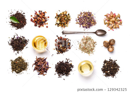 An assortment of various dry tea leaves, showcasing different textures, colors, and blends 129342325