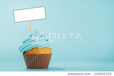 Festive cupcake topped with swirled frosting 129342329