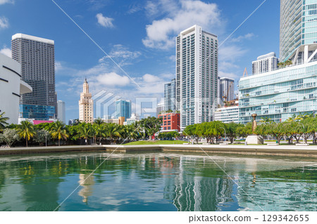 Modern skyline of Miami with towering skyscrapers, tropical vibe, and waterfront views 129342655