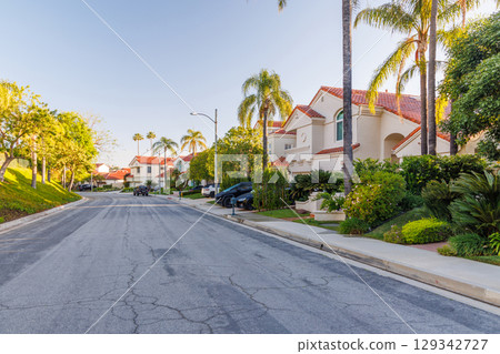 Suburban street with houses in the Los Angeles area Suburban street with houses in the Los Angeles area 129342727