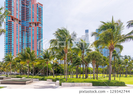 Modern skyline of Miami with towering skyscrapers, tropical vibe, and waterfront views 129342744